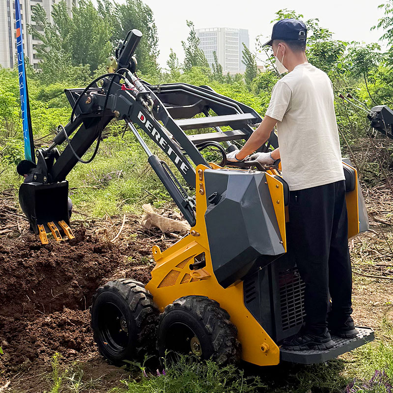 Minicargadora de ruedas con excavadora