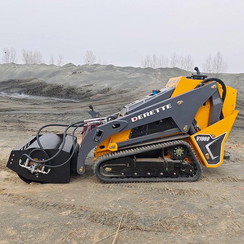 Minicargadora compacta con accesorio de rodillo compactador