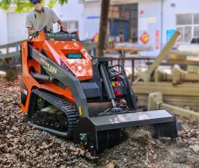 Derette XC1100 Mini Skid Steer Loader with Trench Filler Attachment