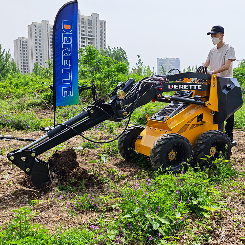 Minicargadora de ruedas con excavadora