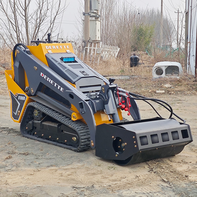 Minicargadora compacta con accesorio de rodillo compactador