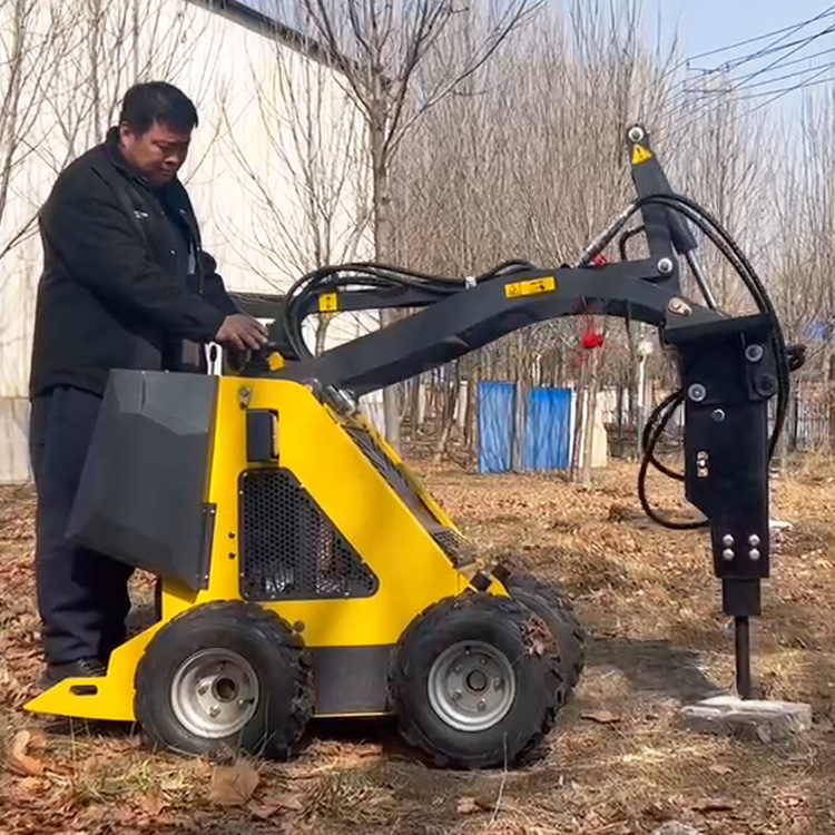 Mini chargeuse compacte 320 W avec marteau hydraulique