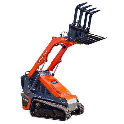 Minicargadora compacta con pinza hidráulica