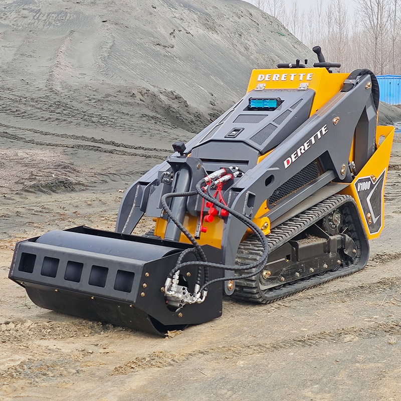 Minicargadora compacta con accesorio de rodillo compactador